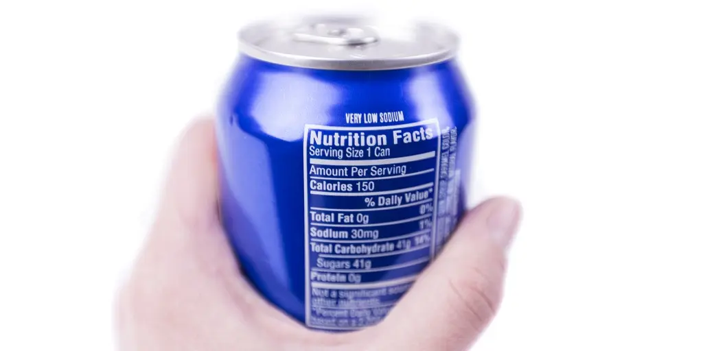 Hand,Holding,Aluminum,Blue,Can,Of,Soft,Drink,Close-up,Isolated