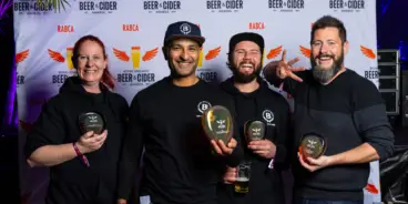 Four people from Barossa Valley holding their awards at the Royal Adelaide Beer & Cider Awards in 2023.