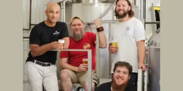 Four men from Barossa Valley Brewing, Western Ridge, Rehn Bier and KI Brewery holding beers