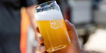 Beer in a glass with Your Mates Brewing logo